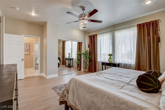 10550 Patrington Ct, Las Vegas, NV 89183 - bedroom with a ceiling fan, a closet, light wood-type flooring, baseboards, and recessed lighting