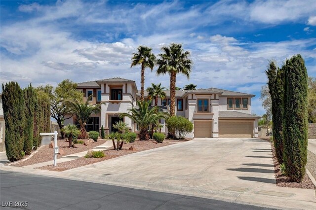 10550 Patrington Ct, Las Vegas, NV 89183 - view of front of property with stucco siding, an attached garage, and concrete driveway