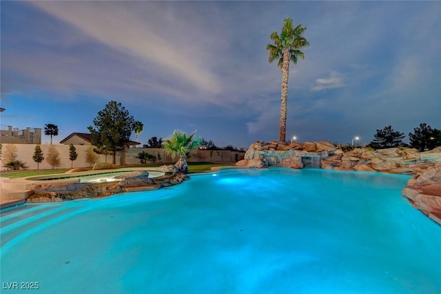 10550 Patrington Ct, Las Vegas, NV 89183 - view of swimming pool with a fenced in pool, a fenced backyard, and an in ground hot tub