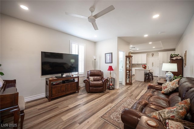 5815 Pristine Falls Ave, Las Vegas, NV 89131 - living room with ceiling fan, light wood finished floors, baseboards, and recessed lighting