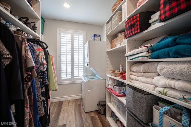 5815 Pristine Falls Ave, Las Vegas, NV 89131 - spacious closet featuring wood finished floors
