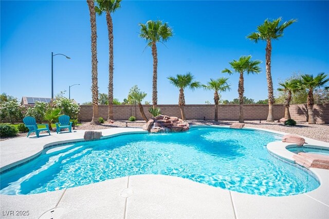 5815 Pristine Falls Ave, Las Vegas, NV 89131 - view of pool featuring a fenced backyard, a patio, and a pool with connected hot tub
