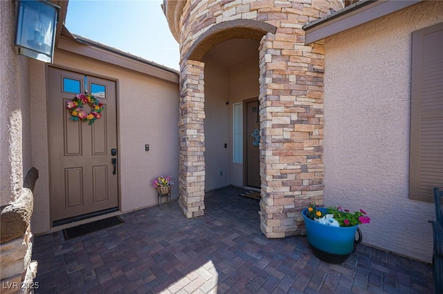 5815 Pristine Falls Ave, Las Vegas, NV 89131 - entrance to property with stucco siding and stone siding