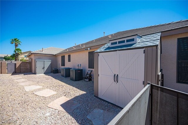 5815 Pristine Falls Ave, Las Vegas, NV 89131 - back of property featuring central AC and a gate