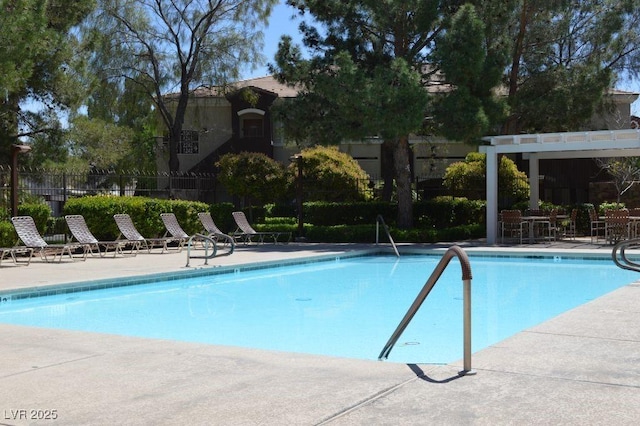 9303 Gilcrease Ave Unit 1097, Las Vegas, NV 89149 - community pool featuring fence and a patio