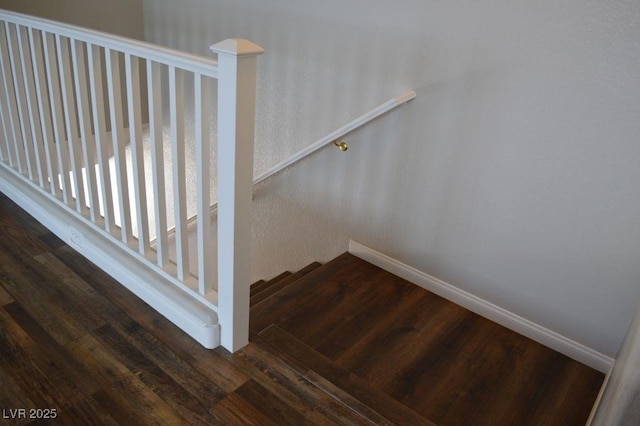 9303 Gilcrease Ave Unit 1097, Las Vegas, NV 89149 - stairway featuring baseboards and wood finished floors