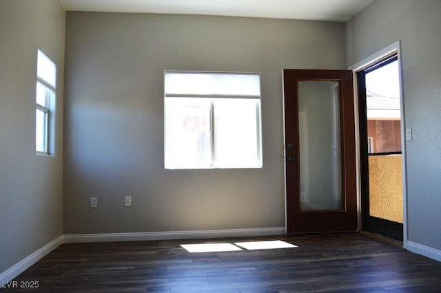 9303 Gilcrease Ave Unit 1097, Las Vegas, NV 89149 - spare room with dark wood-type flooring and baseboards