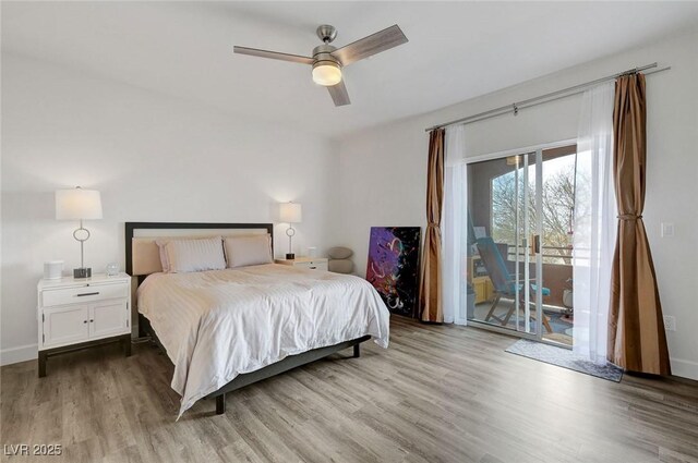 bedroom with baseboards, access to exterior, wood finished floors, and ceiling fan