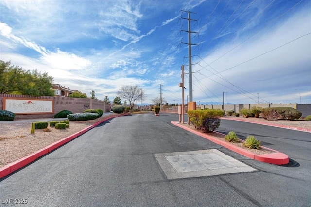 view of road featuring curbs