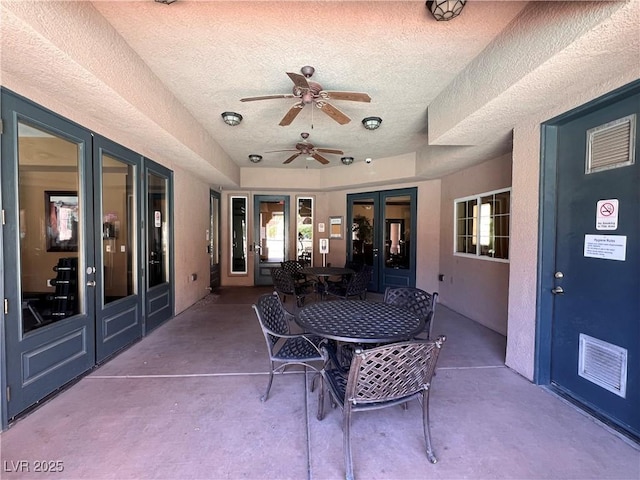 10067 Sand Key St, Las Vegas, NV 89178 - view of patio featuring french doors, ceiling fan, and outdoor dining area
