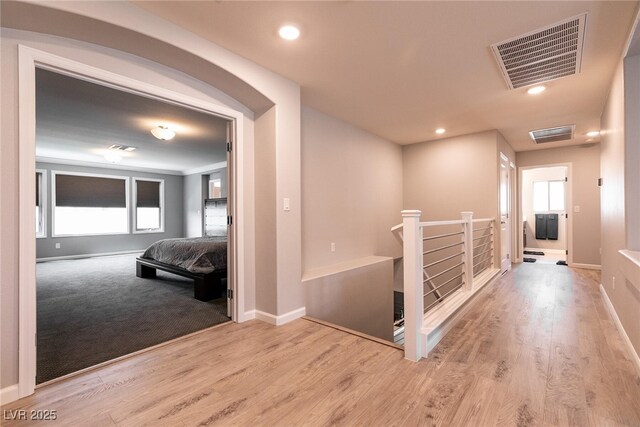 363 Terrill Ave, Las Vegas, NV 89183 - hall with wood finished floors, an upstairs landing, baseboards, and visible vents