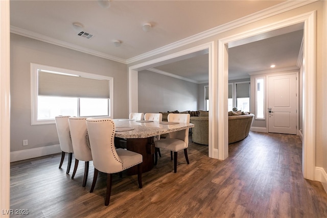 363 Terrill Ave, Las Vegas, NV 89183 - dining area with baseboards, dark wood-style flooring, ornamental molding, and visible vents