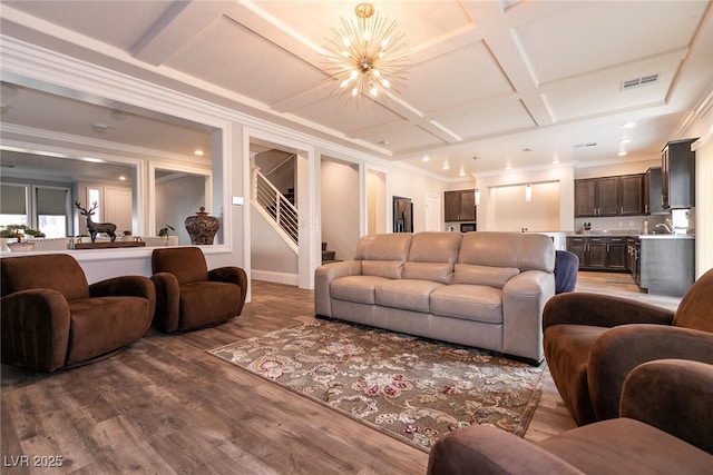363 Terrill Ave, Las Vegas, NV 89183 - living room featuring coffered ceiling, stairs, a chandelier, wood finished floors, and visible vents