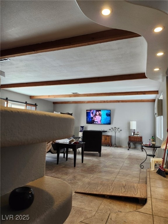 1812 Ivanhoe Way, Las Vegas, NV 89102 - building lobby with beamed ceiling, recessed lighting, and a textured ceiling