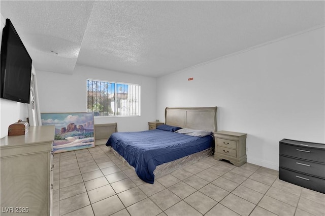 1440 Vegas Valley Dr Unit 1, Las Vegas, NV 89169 - bedroom with a textured ceiling and light tile patterned floors