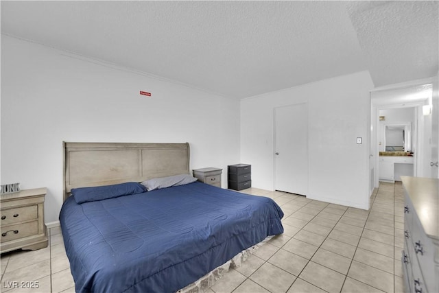 1440 Vegas Valley Dr Unit 1, Las Vegas, NV 89169 - bedroom featuring light tile patterned floors and a textured ceiling