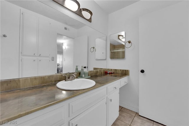 1440 Vegas Valley Dr Unit 1, Las Vegas, NV 89169 - bathroom featuring tile patterned flooring and vanity