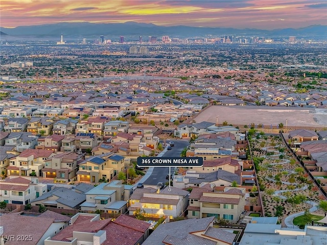 aerial view at dusk with a mountain view
