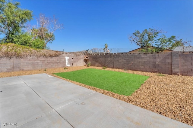 6770 Laronda Ln, Las Vegas, NV 89156 - fenced backyard featuring a patio