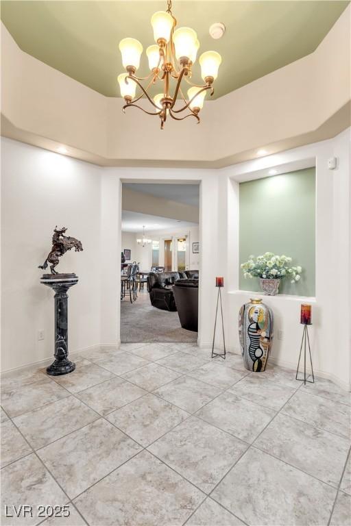 10024 Scenic Walk Ave, Las Vegas, NV 89149 - hall featuring a chandelier and tile patterned floors