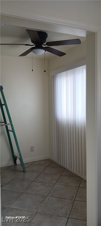 1832 Lewis Ave, Las Vegas, NV 89101 - spare room featuring light tile patterned floors and a ceiling fan