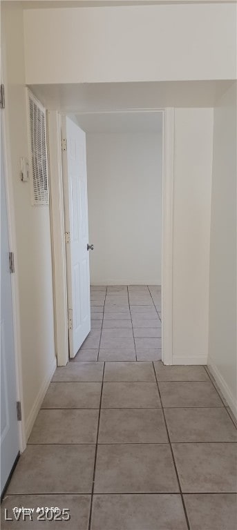 1832 Lewis Ave, Las Vegas, NV 89101 - hallway featuring baseboards and light tile patterned flooring