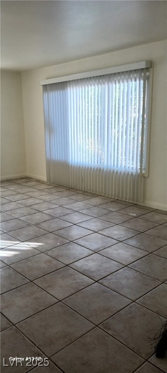 1832 Lewis Ave, Las Vegas, NV 89101 - unfurnished room featuring a wealth of natural light and baseboards