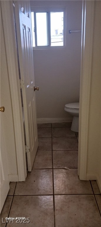 1832 Lewis Ave, Las Vegas, NV 89101 - bathroom featuring tile patterned floors, toilet, and baseboards