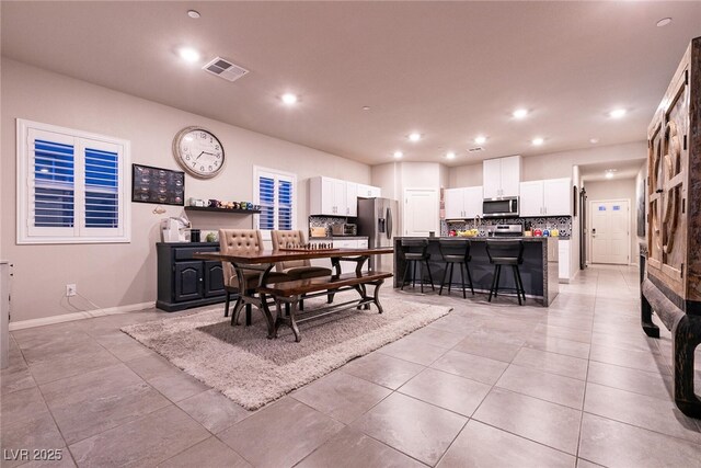 10125 Sequoia Falls Pl, Las Vegas, NV 89149 - dining space featuring baseboards, recessed lighting, and light tile patterned floors