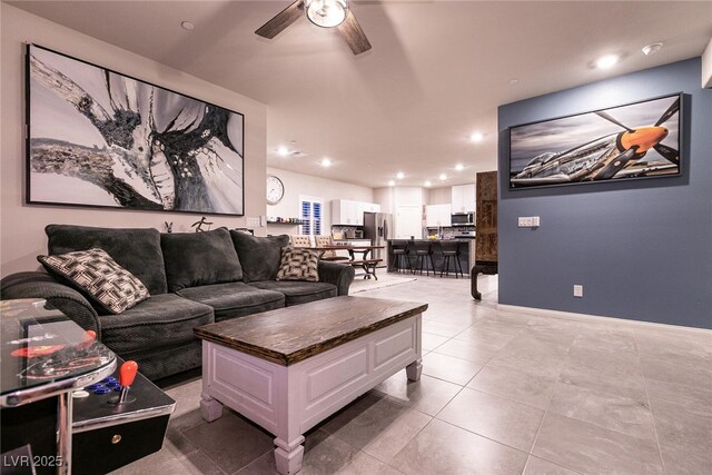 10125 Sequoia Falls Pl, Las Vegas, NV 89149 - living room with ceiling fan, light tile patterned floors, and recessed lighting