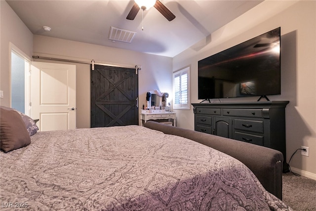 10125 Sequoia Falls Pl, Las Vegas, NV 89149 - bedroom with carpet floors, a barn door, baseboards, and ceiling fan