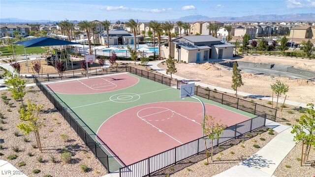 6804 Surf Green Ct, North Las Vegas, NV 89086 - view of sport court with a residential view, fence, and community basketball court