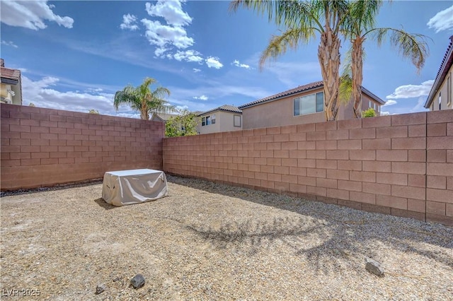 view of yard featuring a fenced backyard