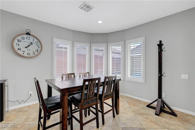 dining room with recessed lighting, baseboards, visible vents, and light tile patterned floors