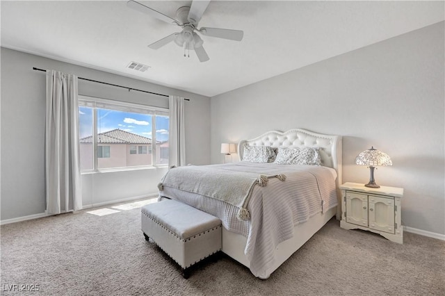 bedroom featuring visible vents, a ceiling fan, baseboards, and light colored carpet