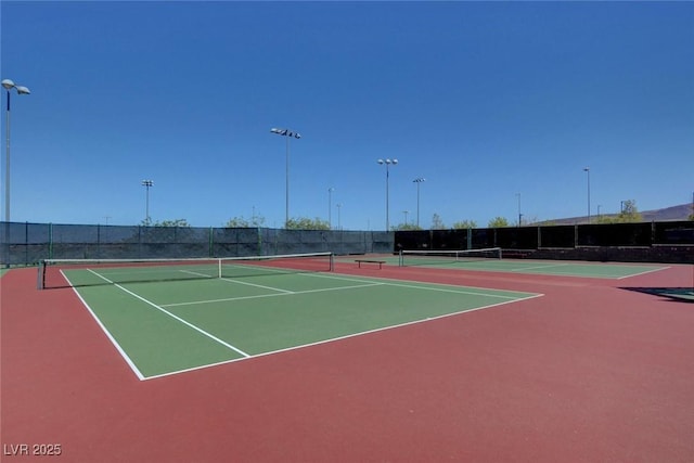 view of sport court featuring fence and community basketball court
