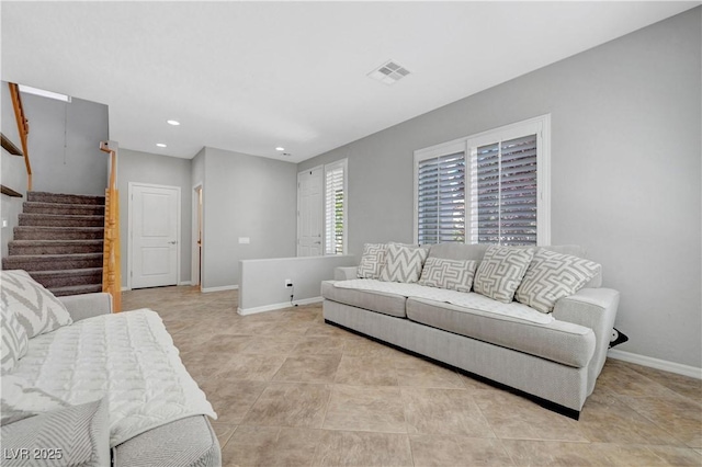 living room featuring visible vents, stairs, baseboards, recessed lighting, and light tile patterned floors