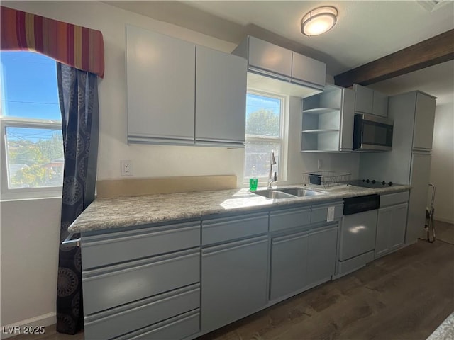 311 Fay Ave, Ely, NV 89301 - kitchen featuring beam ceiling, a sink, dark wood finished floors, dishwashing machine, and stainless steel microwave