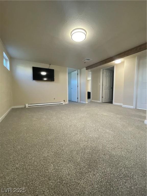 311 Fay Ave, Ely, NV 89301 - below grade area with baseboards, visible vents, and a baseboard heating unit