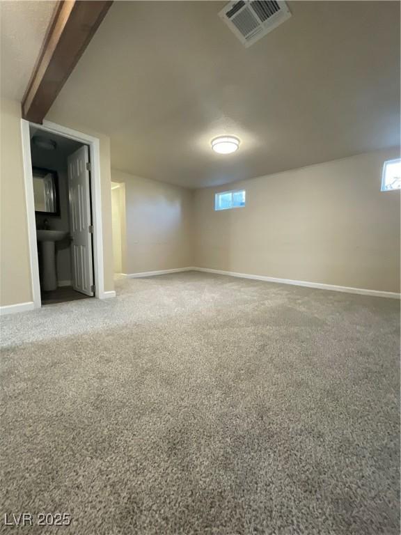 311 Fay Ave, Ely, NV 89301 - basement with carpet floors, baseboards, and visible vents