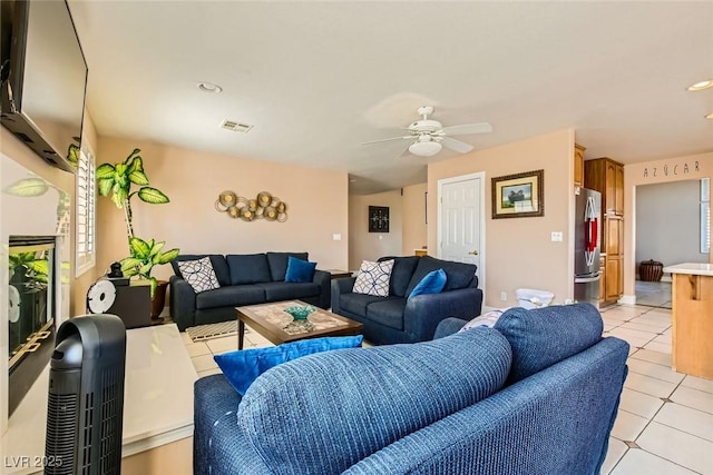 living room with light tile patterned floors, visible vents, recessed lighting, and a ceiling fan