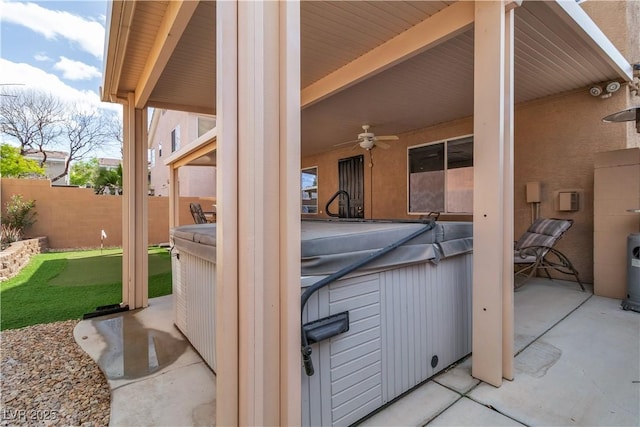 6790 Gold Yarrow St, Las Vegas, NV 89148 - view of patio with a hot tub and ceiling fan
