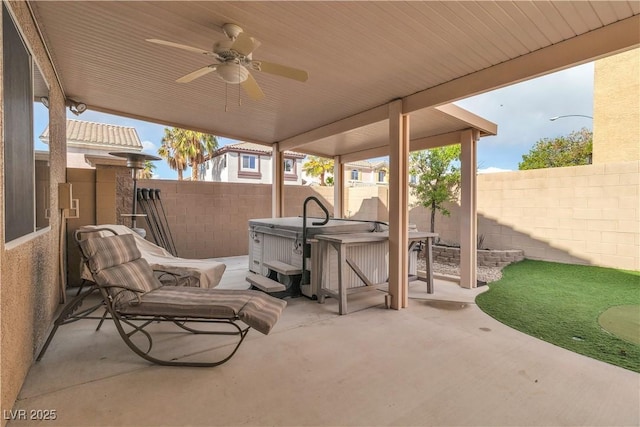 6790 Gold Yarrow St, Las Vegas, NV 89148 - fenced backyard featuring a patio, a hot tub, and ceiling fan