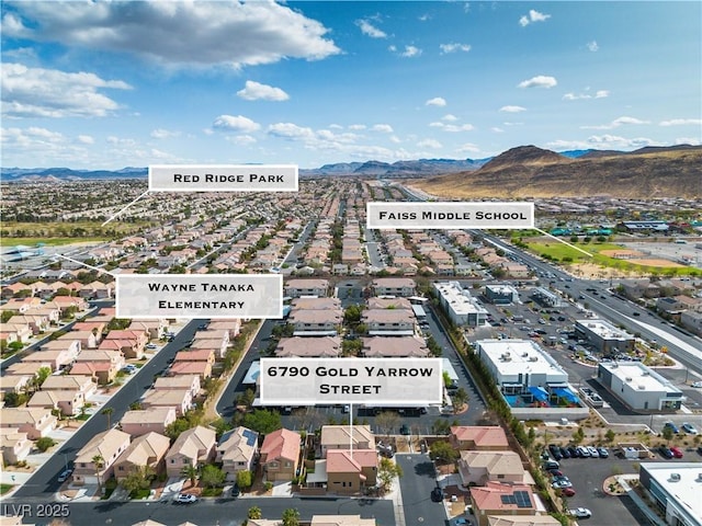 6790 Gold Yarrow St, Las Vegas, NV 89148 - aerial view of residential area featuring a mountainous background