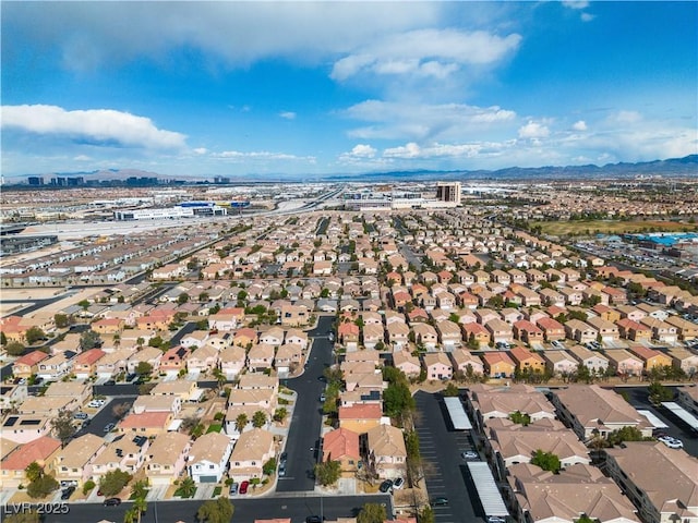 6790 Gold Yarrow St, Las Vegas, NV 89148 - aerial overview of property's location featuring mountains and nearby suburban area