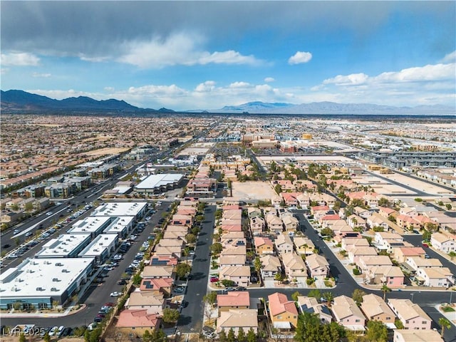 6790 Gold Yarrow St, Las Vegas, NV 89148 - aerial view of property's location with a mountainous background and nearby suburban area
