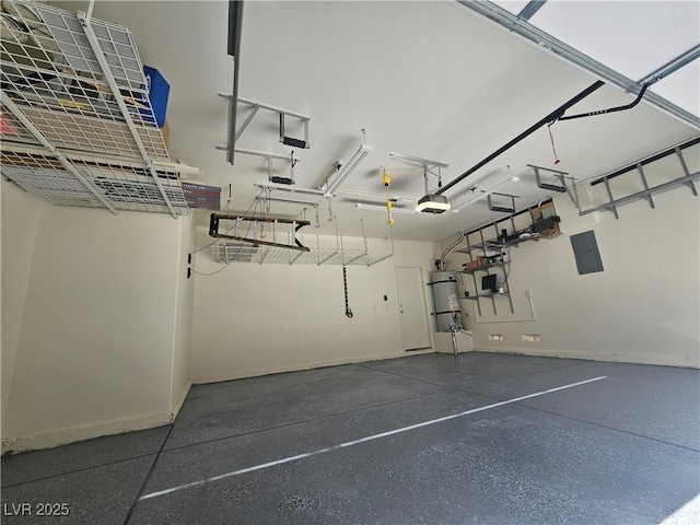 6790 Gold Yarrow St, Las Vegas, NV 89148 - garage with a garage door opener and a central vacuum unit