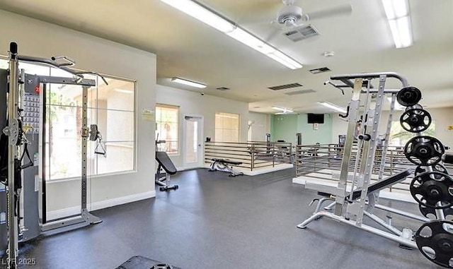 exercise room featuring visible vents and baseboards