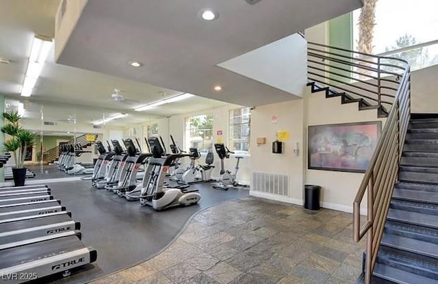 gym with visible vents, recessed lighting, and baseboards