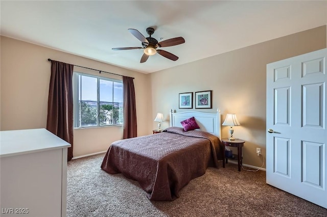 carpeted bedroom with a ceiling fan and baseboards